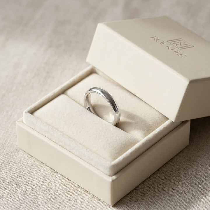 3mm Slightly Domed Comfort-Fit Wedding Band in Platinum, in navy velvet jewelry box