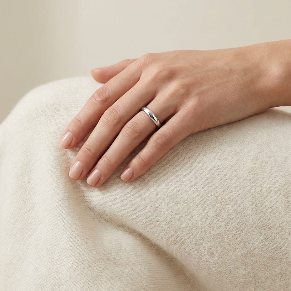 4mm Slightly Domed Comfort-Fit Wedding Band in Platinum, worn on hand, full view