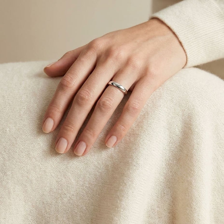4mm Slightly Domed Super Light Comfort-Fit Wedding Band in Platinum, worn on hand, full view