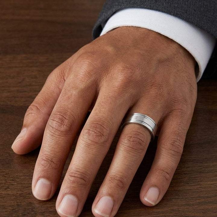 7mm Satin Finish Parallel Groove Carved Wedding Band in Platinum, worn on hand, masculine close-up