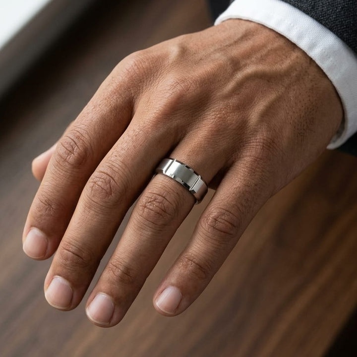 8mm Satin Finish Grooves Carved Wedding Band in Platinum, worn on hand, masculine close-up