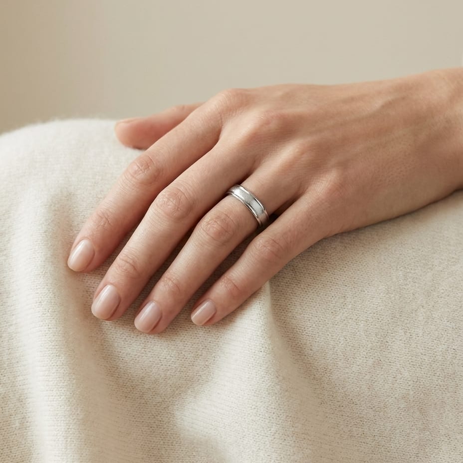 4mm Wired Finish High Polished Round Edge Carved Wedding Band in Platinum, worn on hand, full view