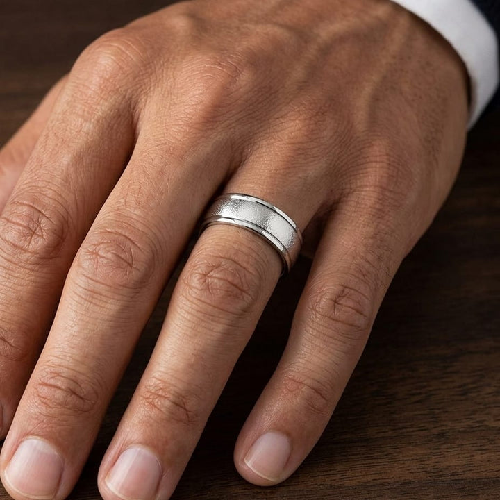 8mm Wire Brush High Polished Round Edge Carved Wedding Band in Platinum, worn on hand, masculine close-up