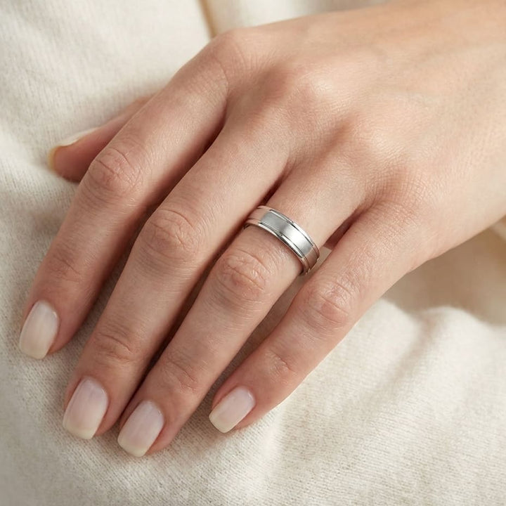 4mm Satin Finish High Polished Round Edge Carved Wedding Band in Platinum, worn on hand, close-up