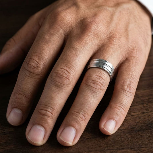 8mm Satin Finish High Polished Center Trim Carved Wedding Band in Platinum, worn on hand, masculine close-up