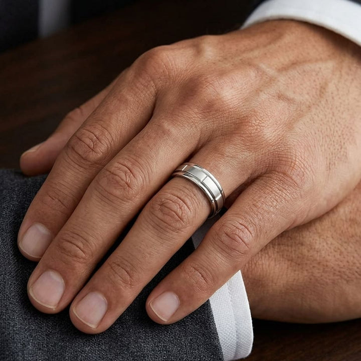 6mm Satin Finish High Polished Center Cut Carved Wedding Band in Platinum, worn on hand, masculine close-up