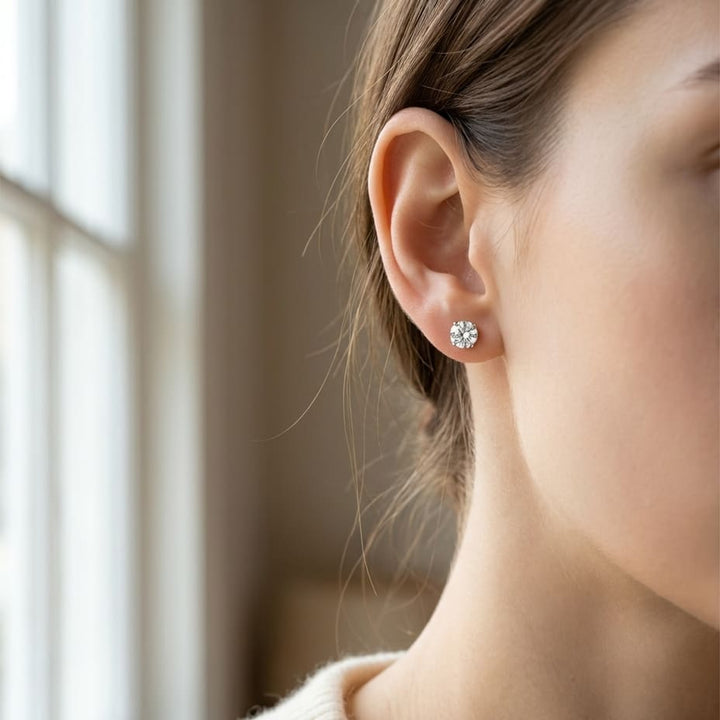 Natural Diamond Round Brilliant Stud Earrings in Platinum, 1 ct. t.w., worn close-up portrait