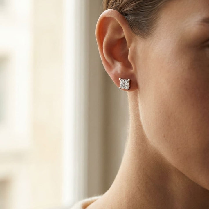 Natural Diamond Princess Cut Four Prong Stud Earrings in Platinum, 1/2 ct. t.w., worn close-up portrait