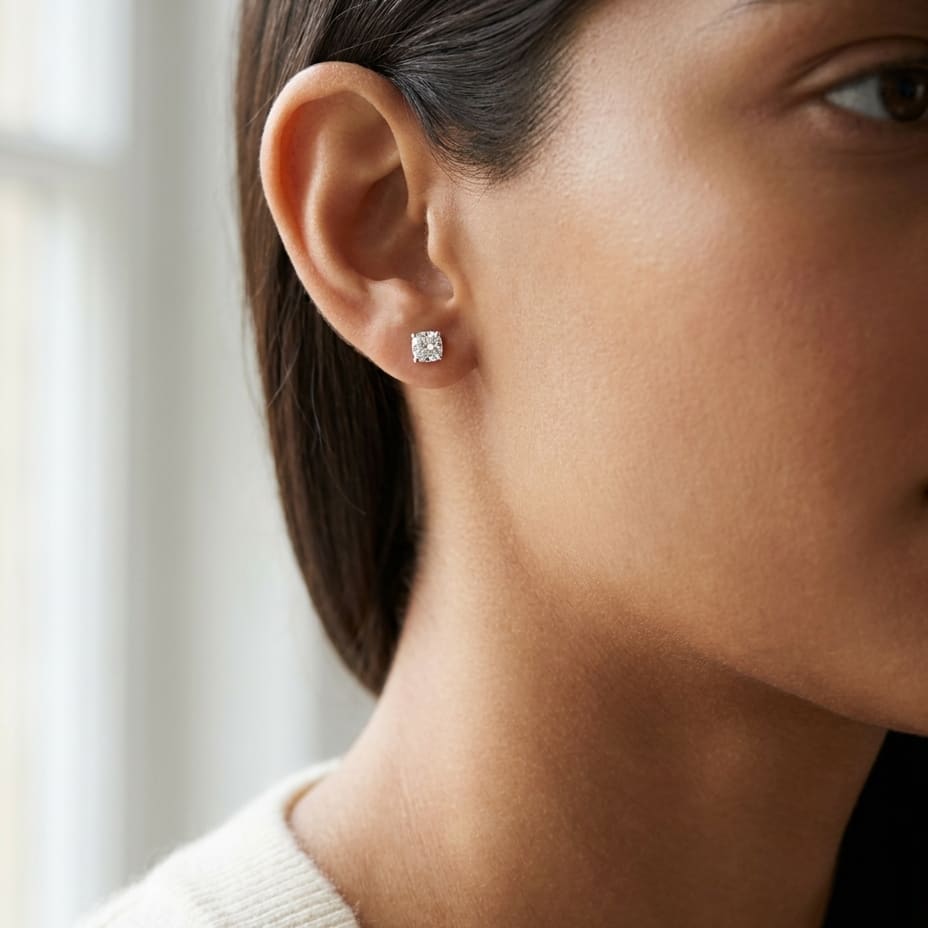 Natural Diamond Round Brilliant Eight Prong Stud Earrings in Platinum, 1 ct. t.w., worn close-up portrait