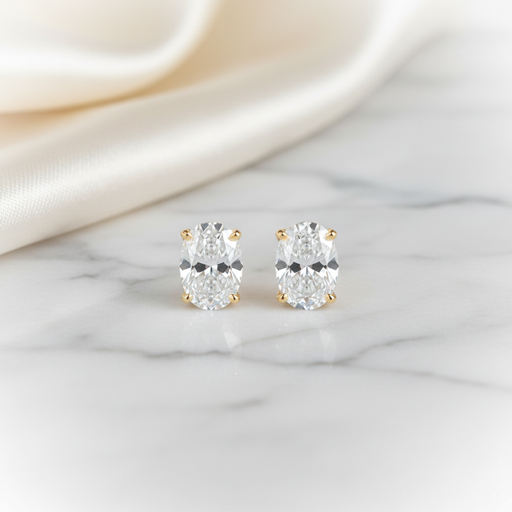 Natural Diamond Oval 4-Prong Stud Earrings · 1.5ct tw — 14K Yellow Gold