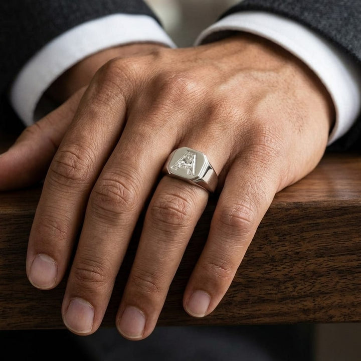 Diamond Letter Signet Ring - Platinum, worn on hand, masculine close-up