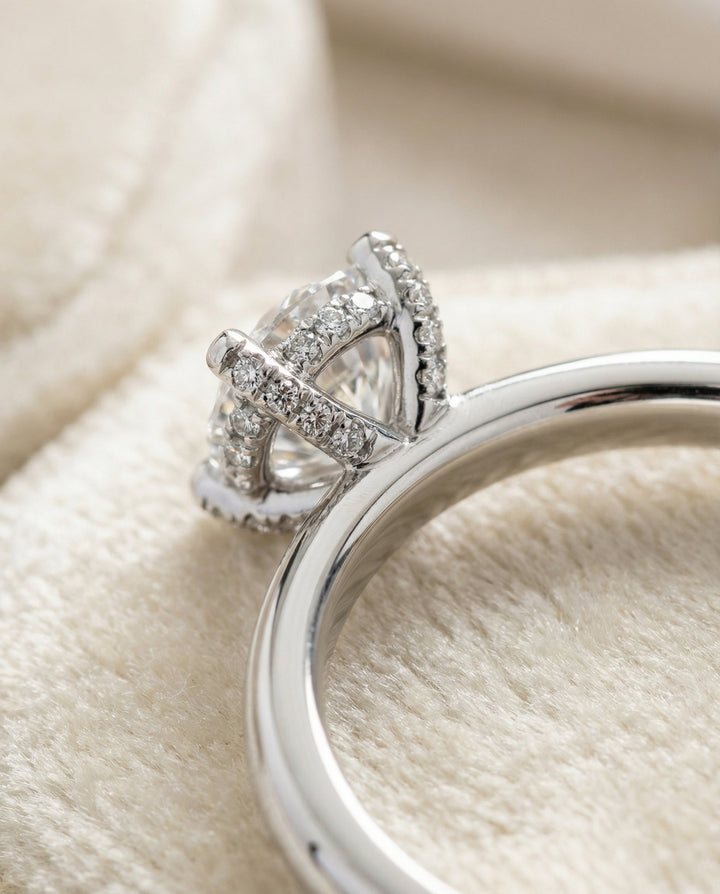 Secret Halo Adorned Prong Solitaire Cushion, in Platinum – lifestyle shot | RockHer