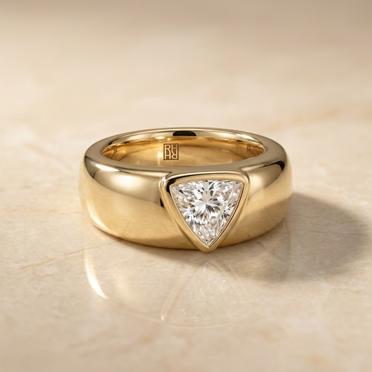 The Remi Select — Bezel-Set Cigar Band Trillion in 18K Yellow Gold