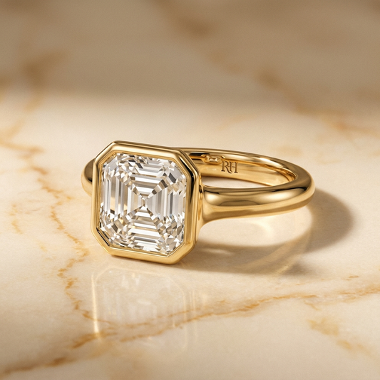 The Agnes Select bezel solitaire asscher engagement ring in 18k yellow gold — alt-angle hero — RockHer