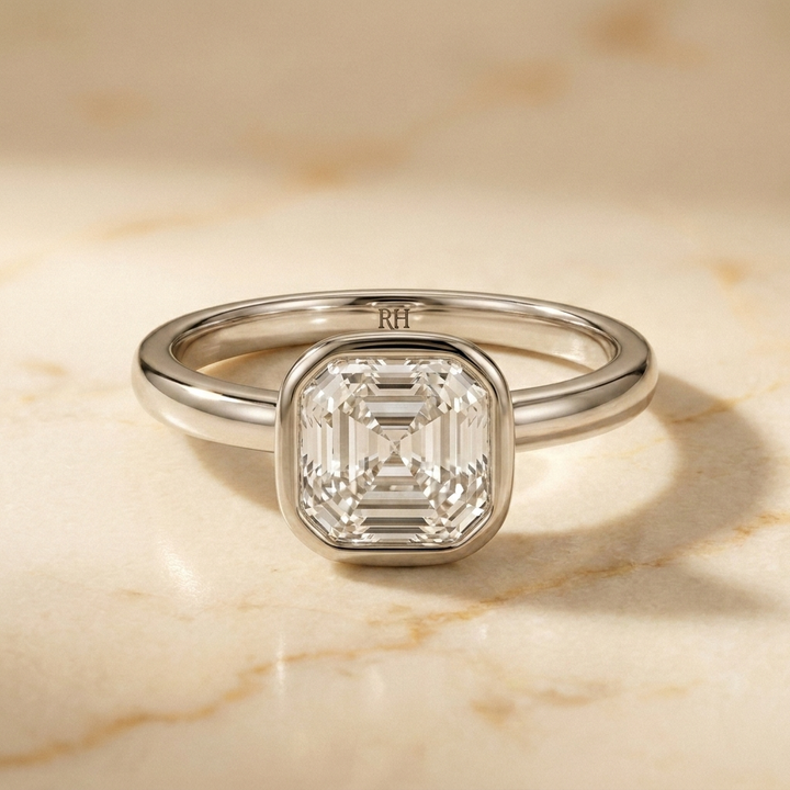 The Agnes Select bezel solitaire asscher engagement ring in platinum — front view — RockHer