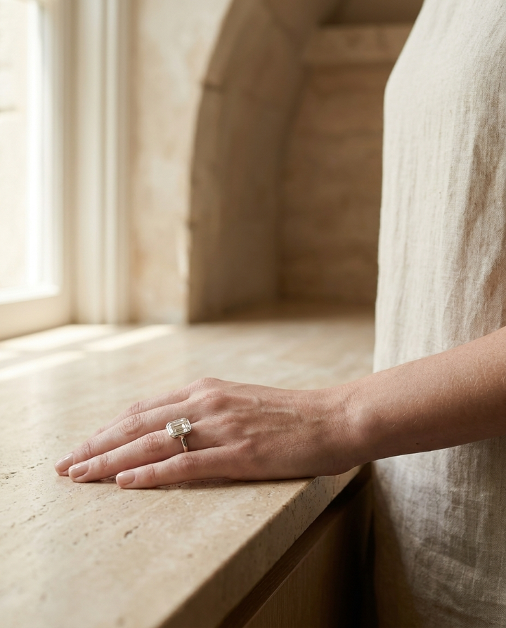 The Agnes Select bezel solitaire asscher engagement ring in 18k white gold — lifestyle — RockHer
