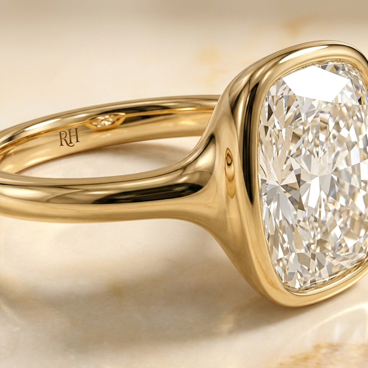 The Agnes Select bezel solitaire cushion engagement ring in 18k yellow gold — construction detail — RockHer