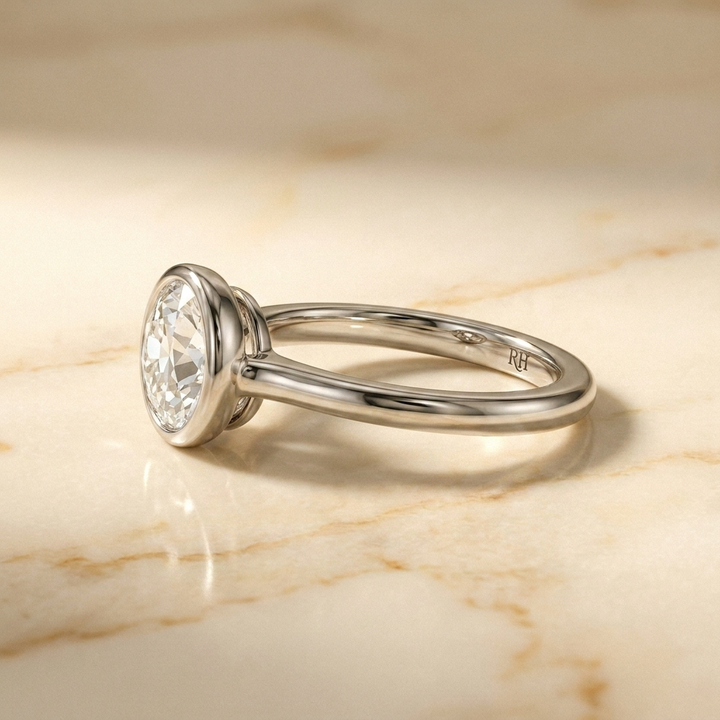 The Agnes Select bezel solitaire old european cut engagement ring in platinum — side profile — RockHer