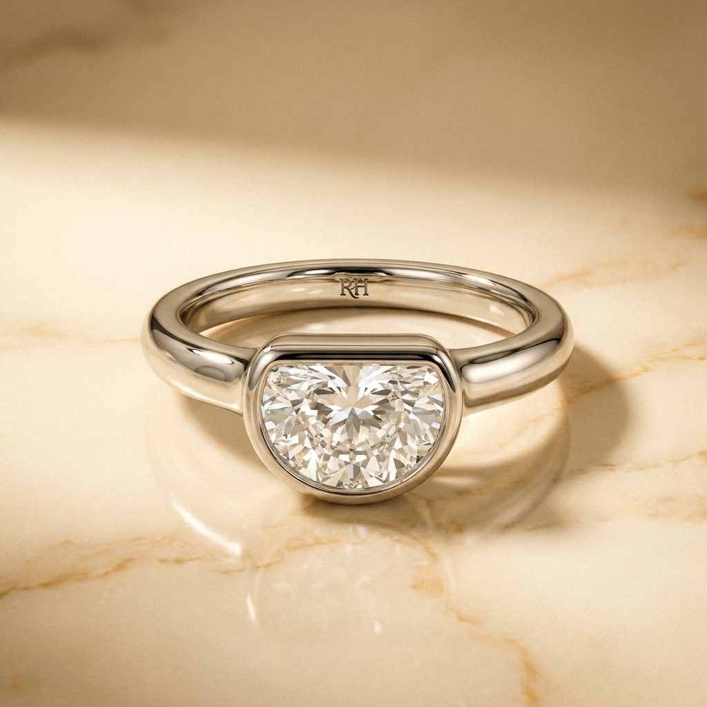 The Agnes Select bezel solitaire half cut engagement ring in 18k white gold — front view — RockHer
