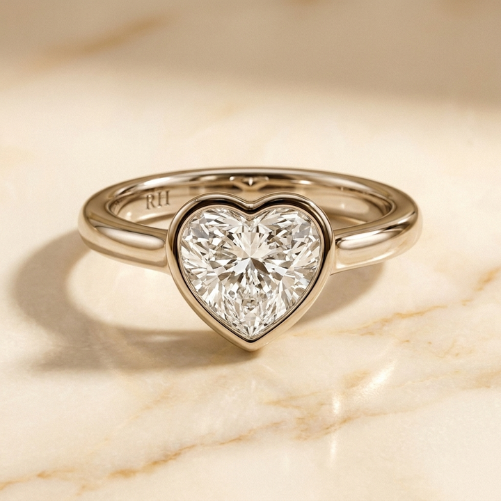 The Agnes bezel solitaire heart engagement ring setting in 18k white gold — front view — RockHer