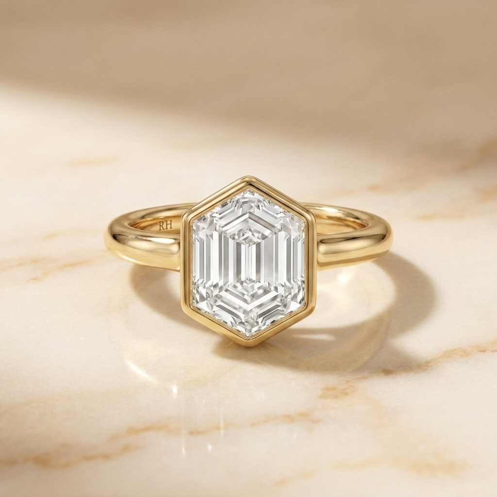 The Agnes Select bezel solitaire hexagonal engagement ring in 18k yellow gold — front view — RockHer