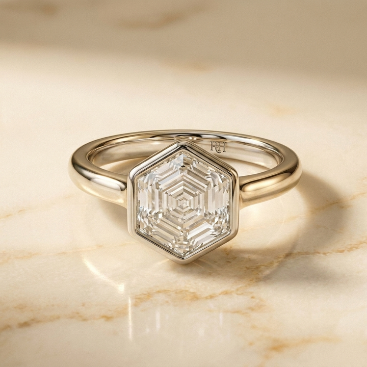 The Agnes Select bezel solitaire hexagonal engagement ring in 18k white gold — front view — RockHer
