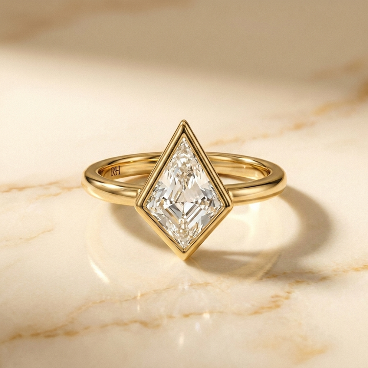 The Agnes Select bezel solitaire kite engagement ring in 18k yellow gold — front view — RockHer