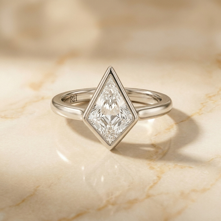 The Agnes Select bezel solitaire kite engagement ring in 18k white gold — front view — RockHer