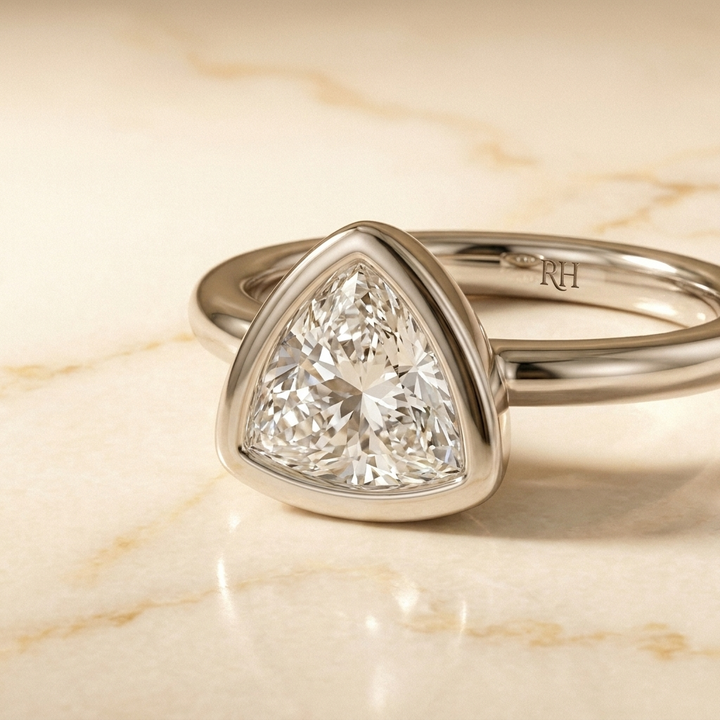 The Agnes Select bezel solitaire trillion engagement ring in 18k white gold — construction detail — RockHer