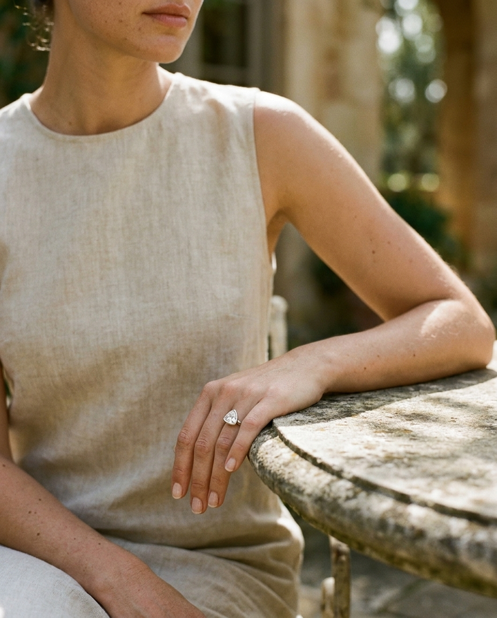 The Agnes Select bezel solitaire trillion engagement ring in platinum — lifestyle — RockHer