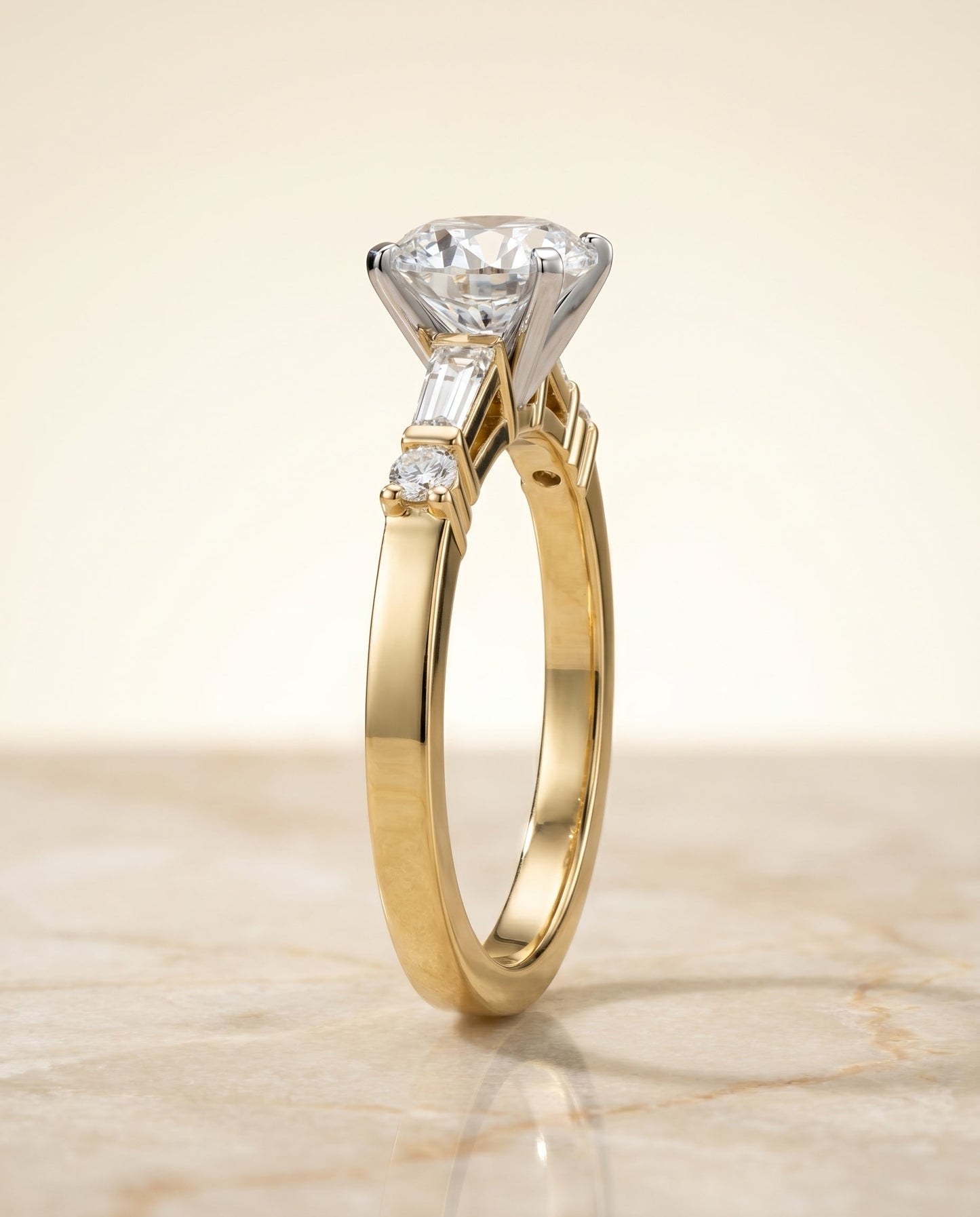 Round Brilliant, Baguette and Round Side Stone, in 18K Yellow Gold – side profile | RockHer