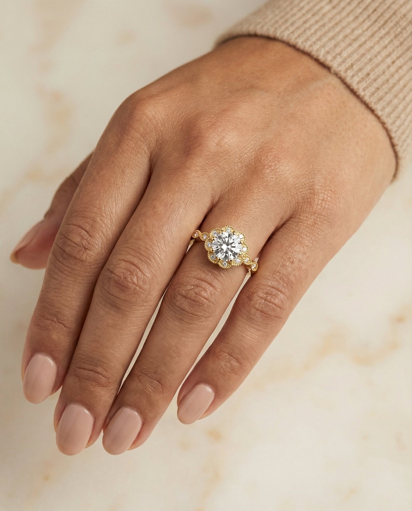 Round Brilliant, Beaded Floral Halo Leaf Shoulders, in 18K Yellow Gold, pave setting – lifestyle shot | RockHer
