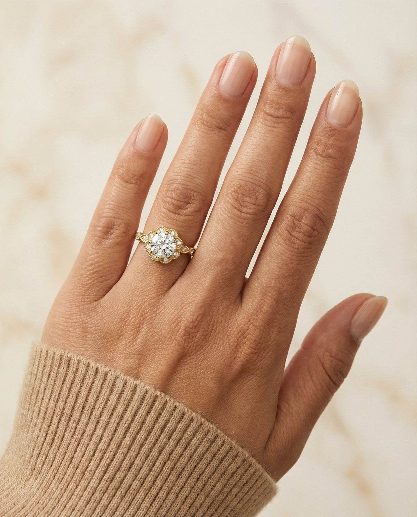Round Brilliant, Beaded Floral Halo Leaf Shoulders, in 18K Yellow Gold, pave setting – lifestyle shot | RockHer