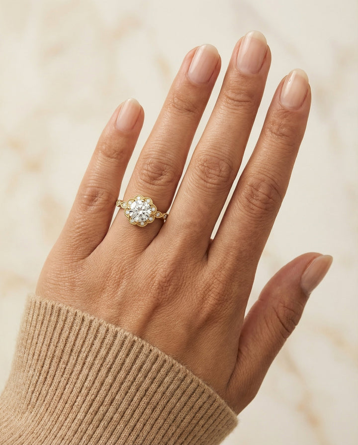 Round Brilliant, Beaded Floral Halo Leaf Shoulders, in 18K Yellow Gold, pave setting – lifestyle shot | RockHer