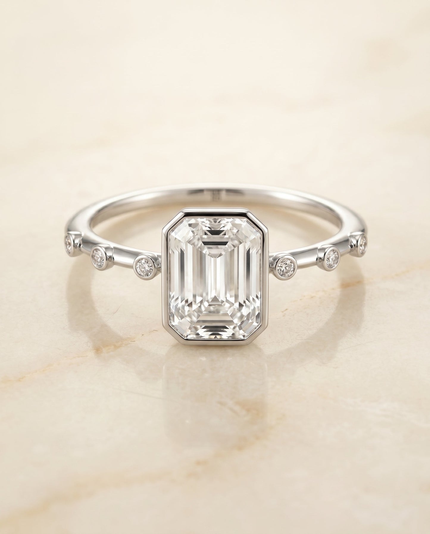 The Brandi Bezel Solitaire Engagement Ring Setting for Emerald Cut Diamonds in 18K White Gold | RockHer
