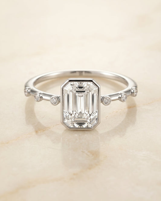 The Brandi Bezel Solitaire Engagement Ring Setting for Emerald Cut Diamonds in 18K White Gold | RockHer