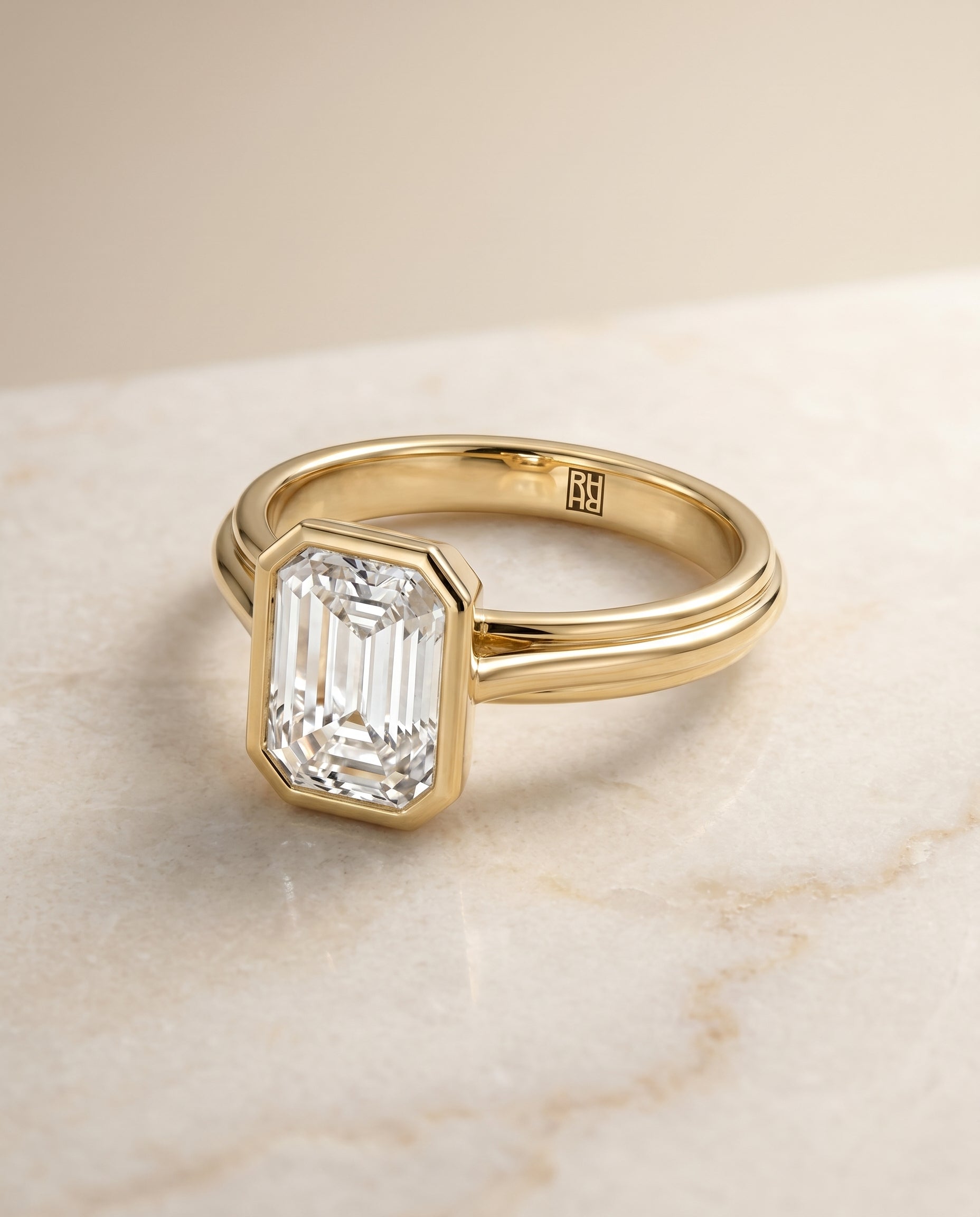 European Cut, Bezel Cathedral Solitaire Emerald, in 18K Yellow Gold – angled view | RockHer