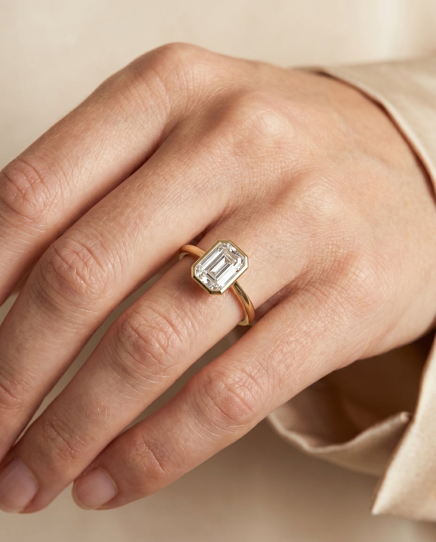 European Cut, Bezel Cathedral Solitaire Emerald, in 18K Yellow Gold – lifestyle shot | RockHer