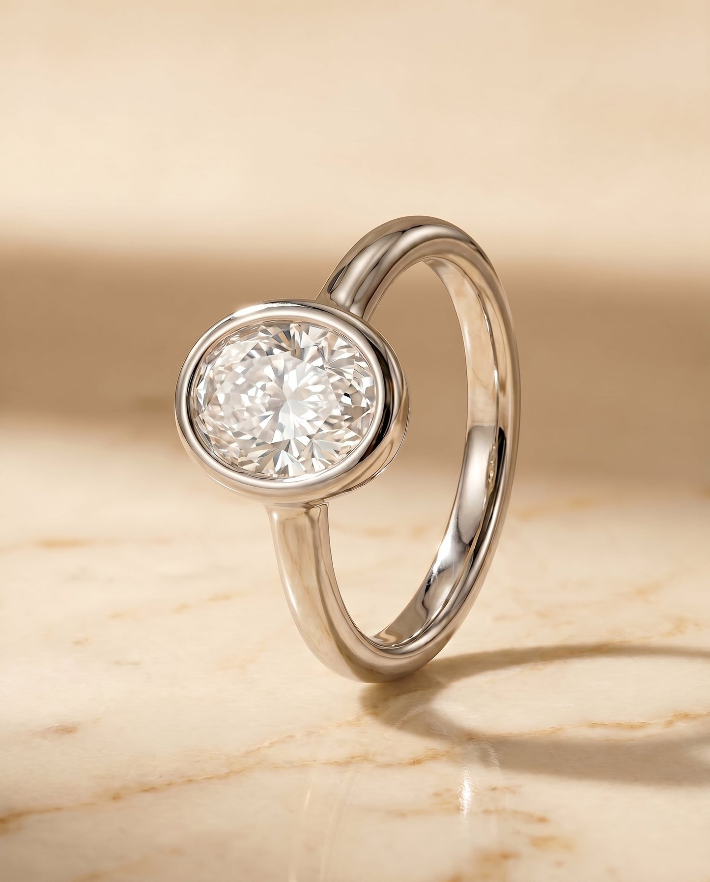 ตัวเรือนแหวนหมั้นเพชร Agnes Bezel Solitaire สำหรับเพชรทรงไข่ ตัวเรือนทองคำขาว 18K