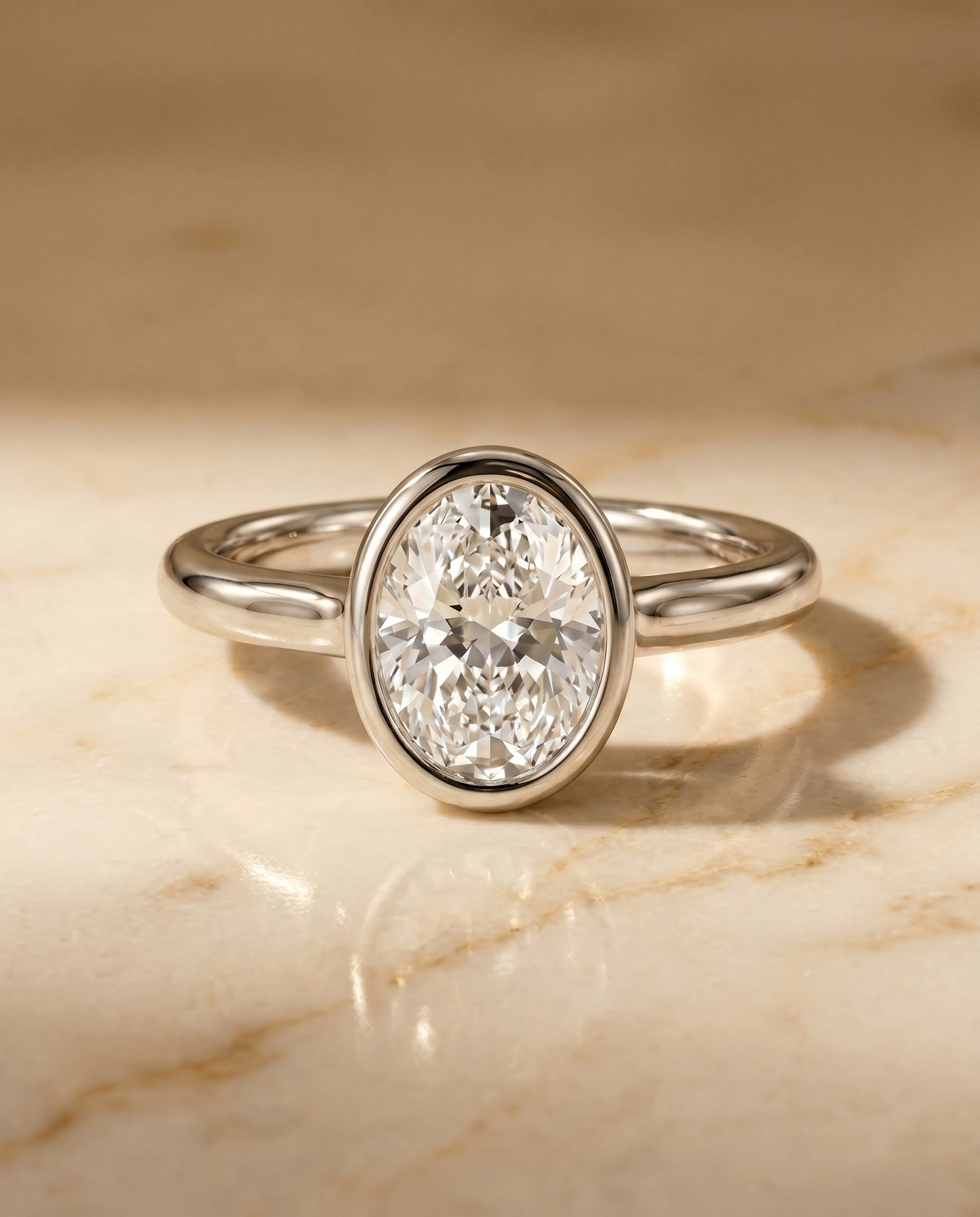 The Agnes Bezel Solitaire Engagement Ring Setting for Oval Diamonds in Platinum | RockHer