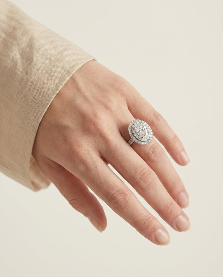 Dinah bold double halo engagement ring in 18K white gold with oval lab diamond — RockHer