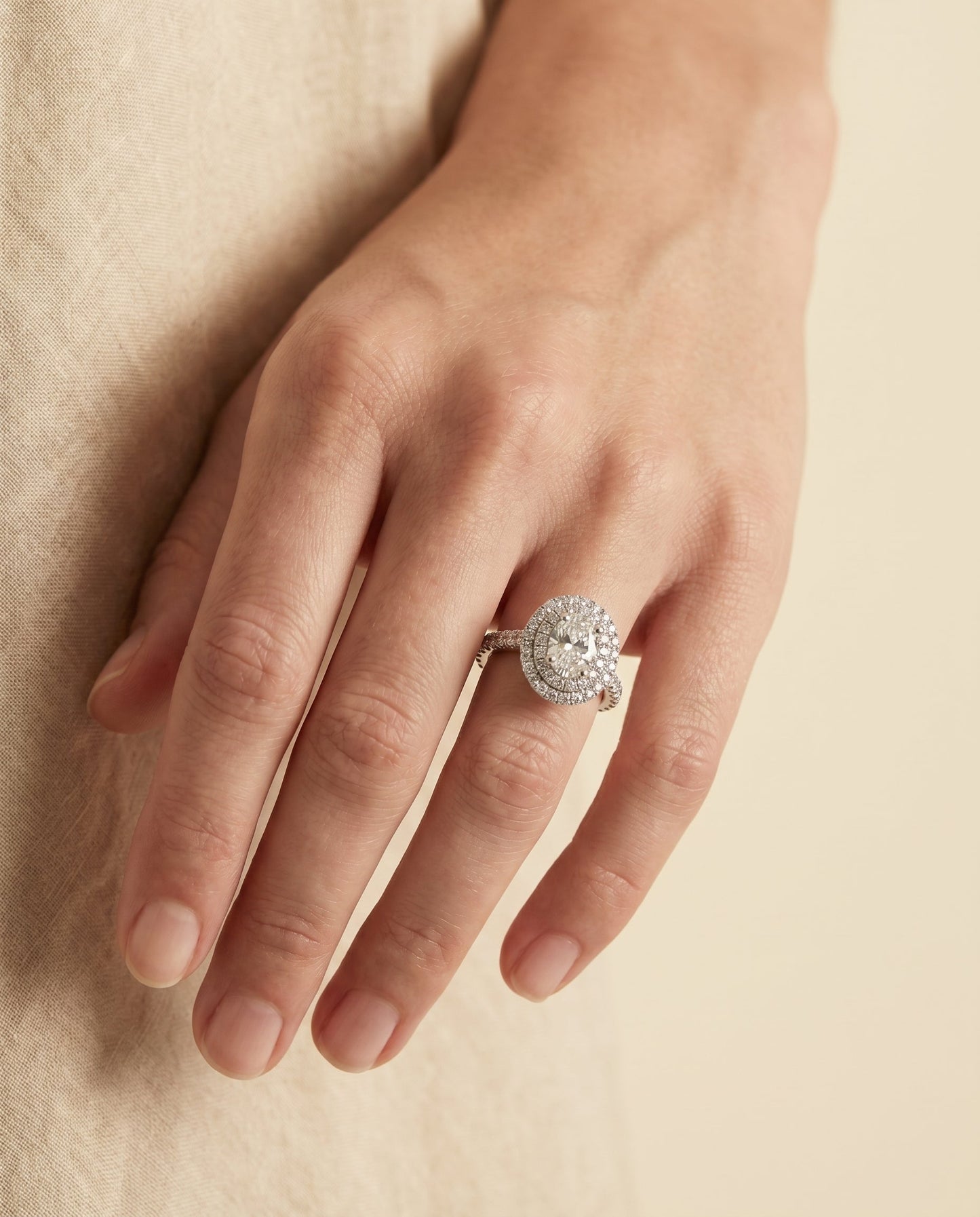 Bold Double Halo Oval, in Platinum, pave setting – lifestyle shot | RockHer