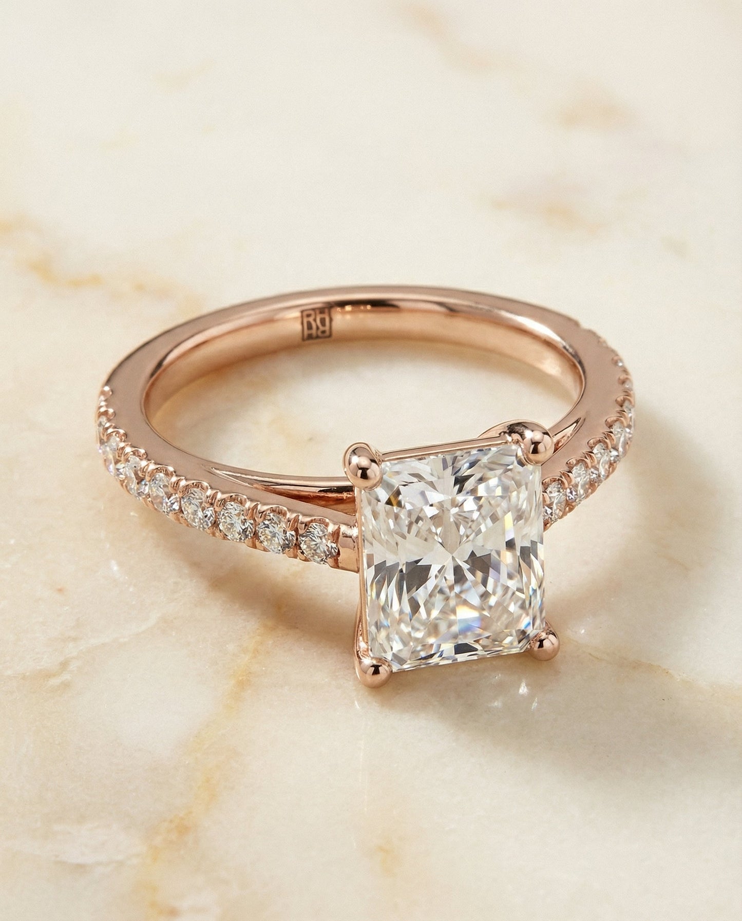 Cathedral French Pavé Solitaire Radiant, in 14K Rose Gold, pave setting – angled view | RockHer