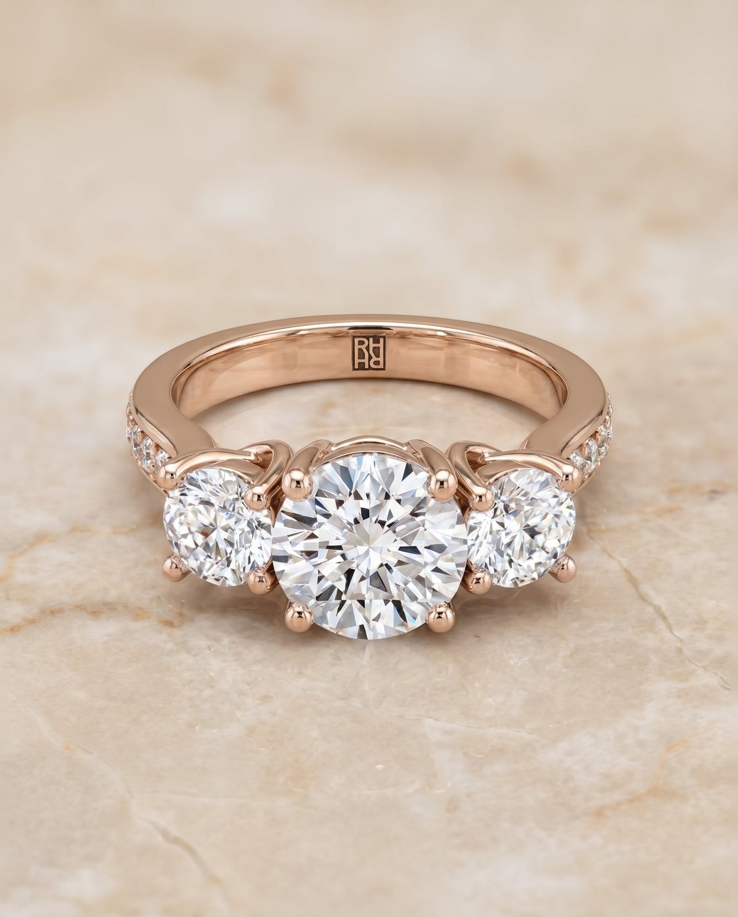Avery Select Channel Pave Three Stone Solitaire in 14K Rose Gold – view 1