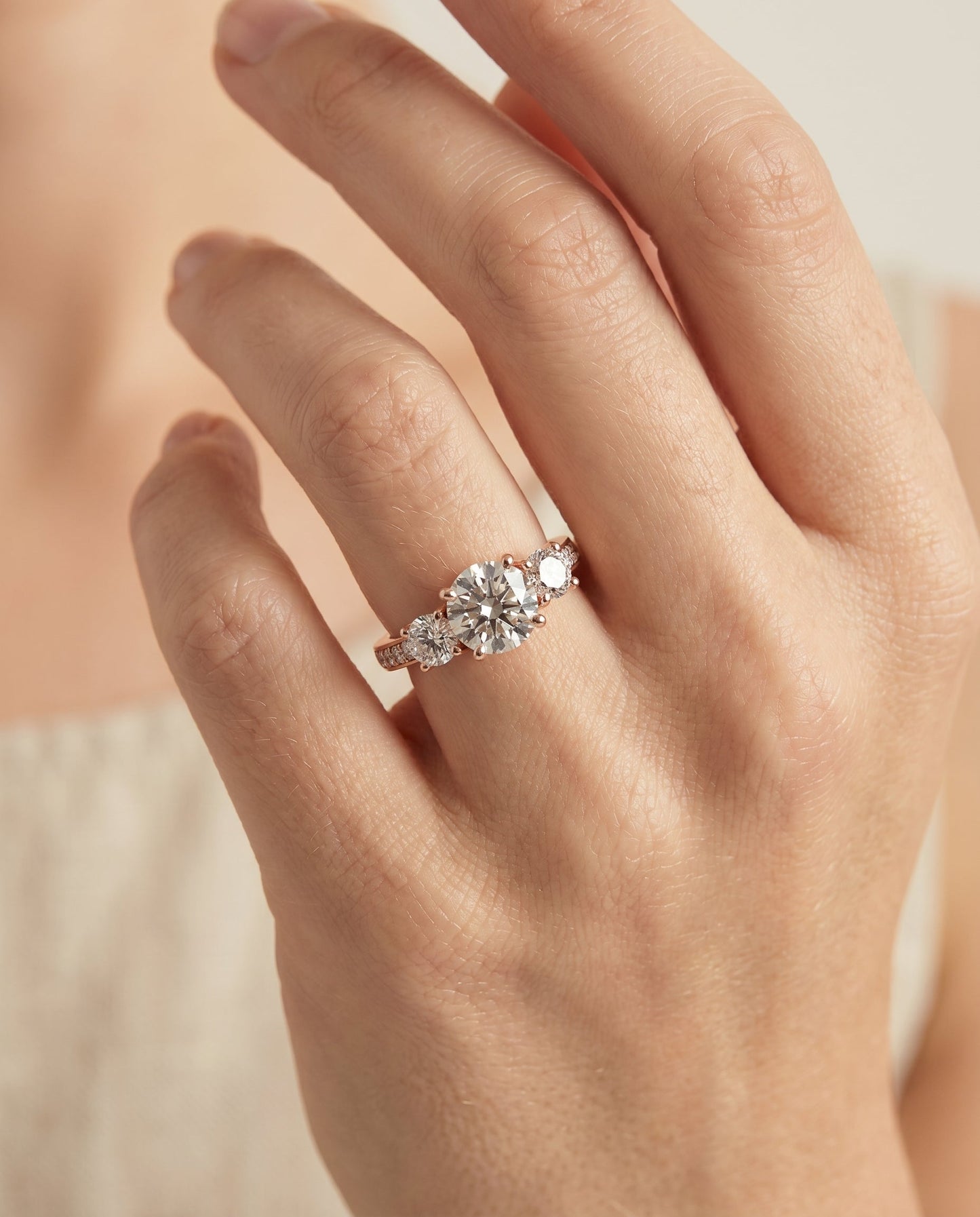 Avery Select Channel Pave Three Stone Solitaire in 14K Rose Gold – view 5