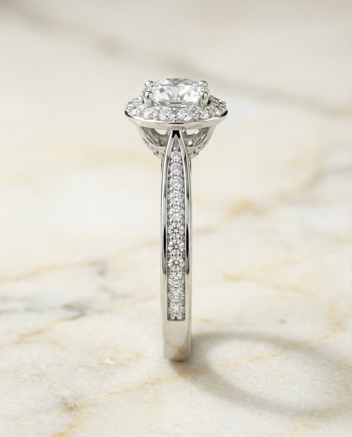 Round Brilliant, Channel Row Pavé Halo, in Platinum, prong setting – side profile | RockHer