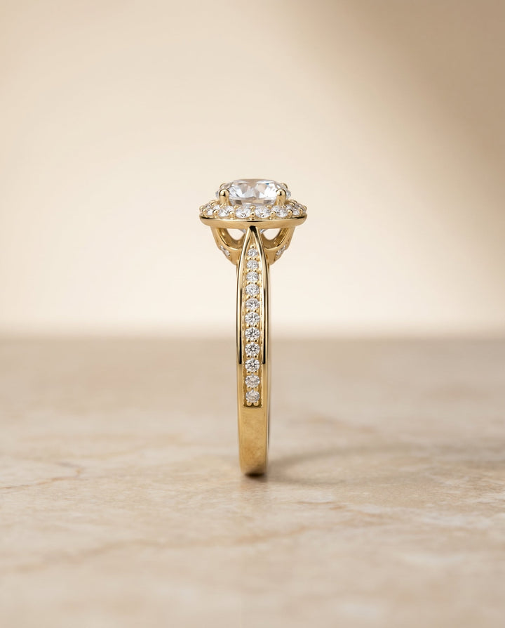 Round Brilliant, Channel Row Pavé Halo, in 18K Yellow Gold, prong setting – side profile | RockHer