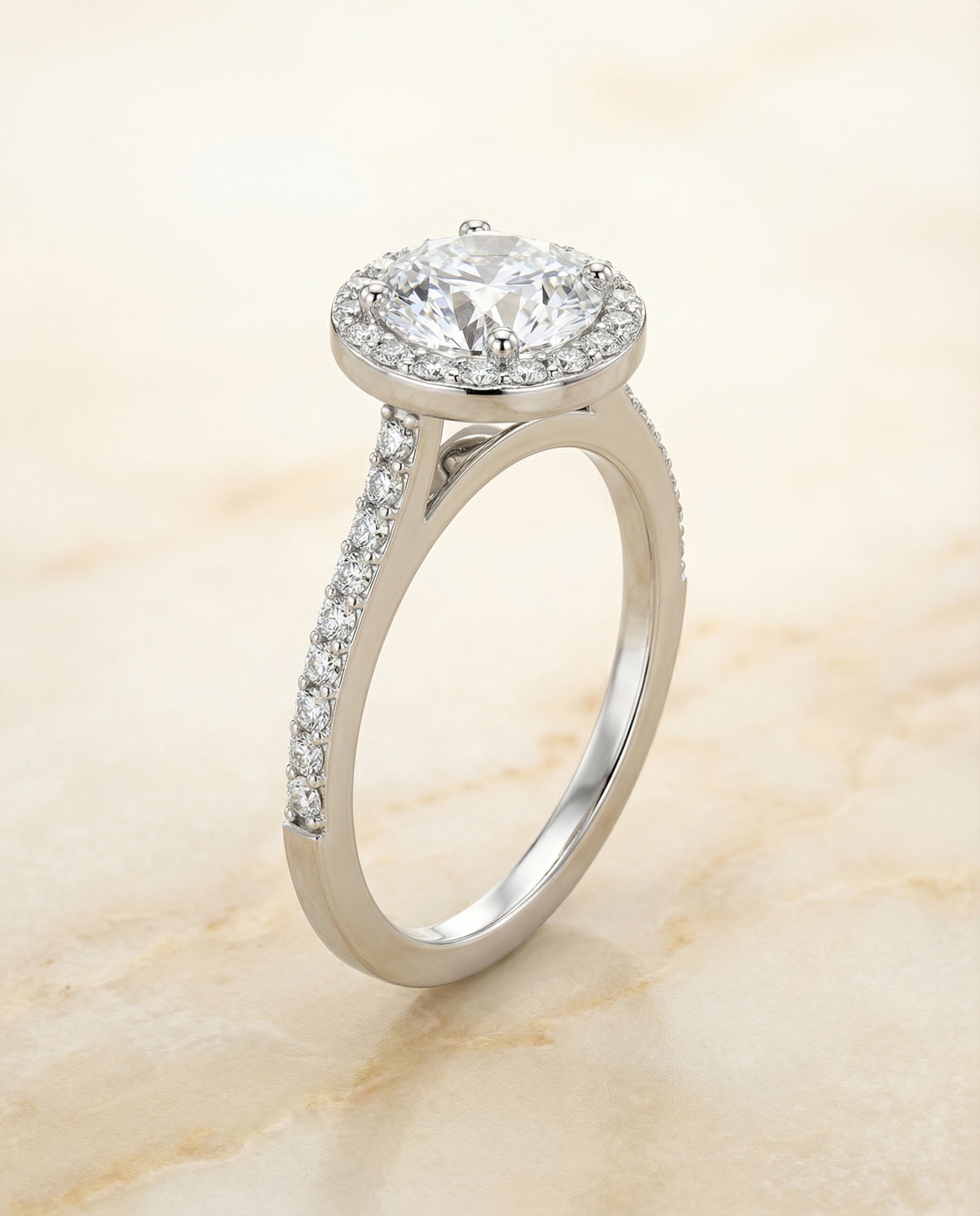 Round Brilliant, Classic French Pavé Halo Round, in Platinum, pave setting – angled view | RockHer