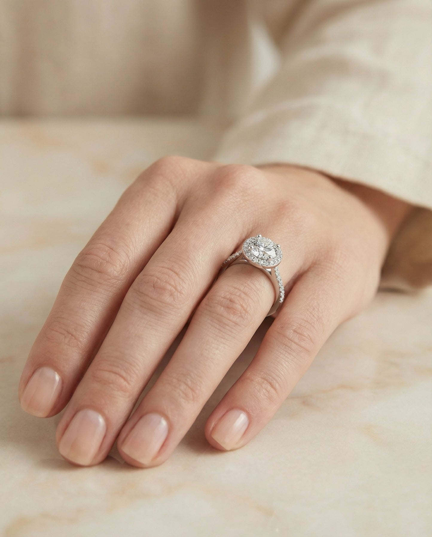 Round Brilliant, Classic French Pavé Halo Round, in Platinum, pave setting – lifestyle shot | RockHer