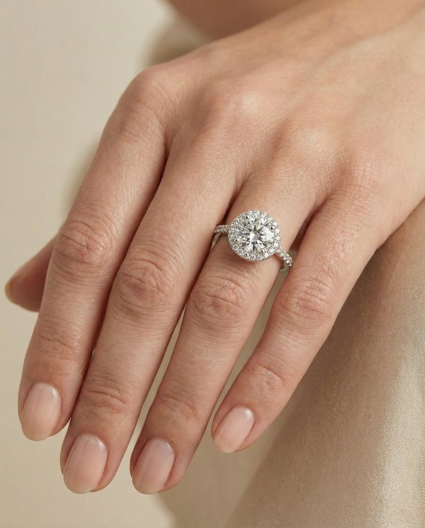 Round Brilliant, Classic French Pavé Halo, in 18K White Gold, pave setting – lifestyle shot | RockHer